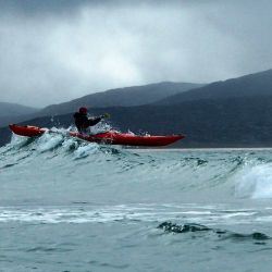 jumping waves in a sea kayak