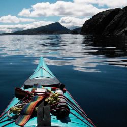 kayaking on a mirror calm ocean